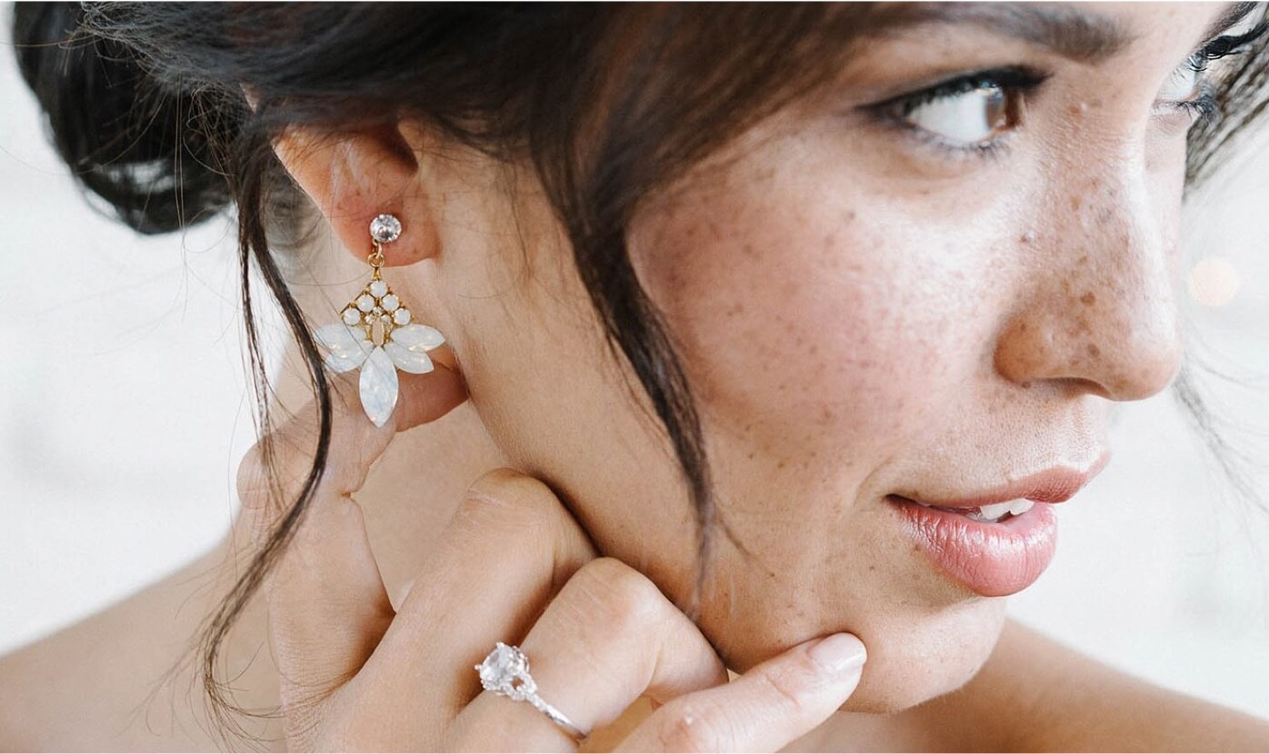 Model wearing floral TBG Prom earrings